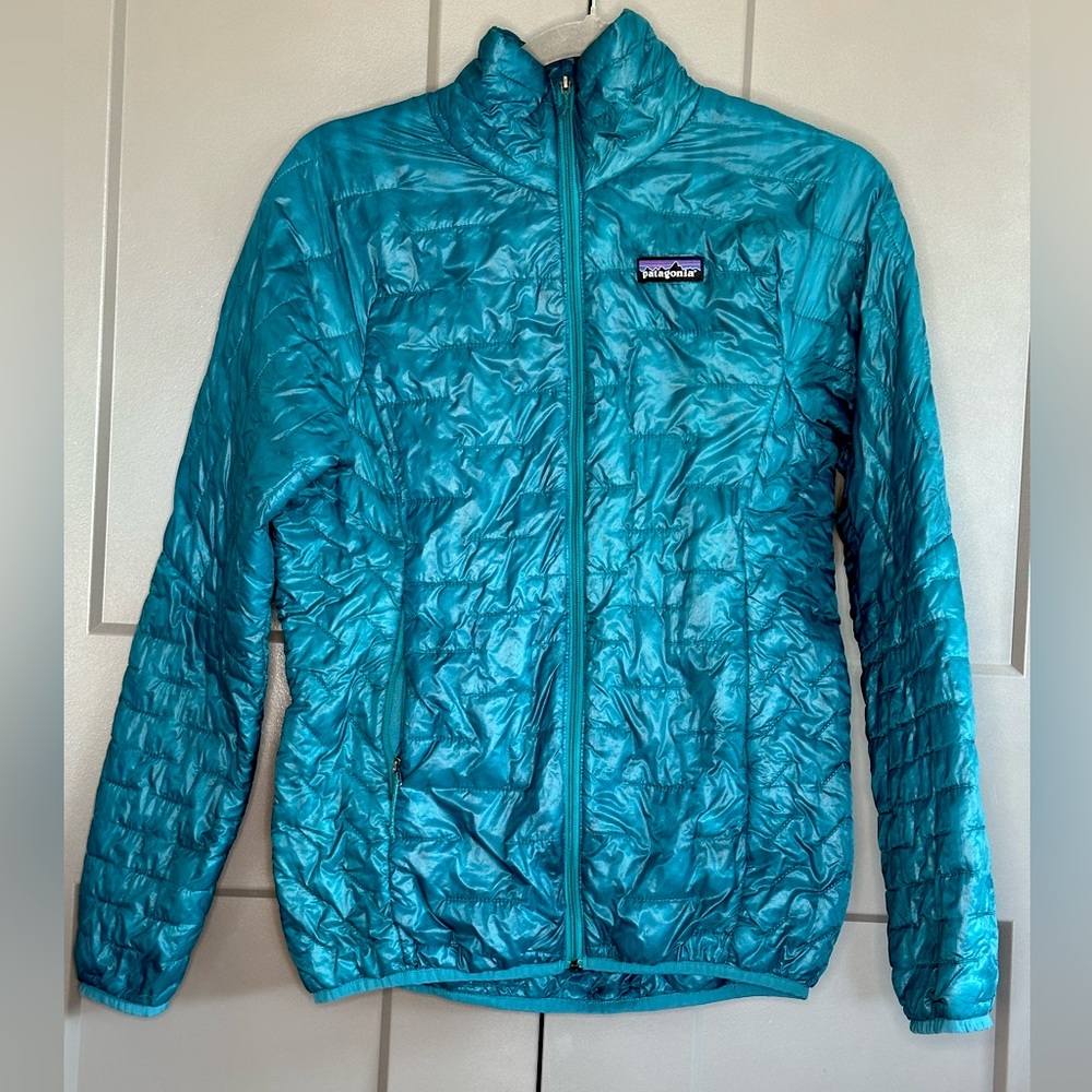 Blue Patagonia nano puff jacket XS good condition, small tear in right shoulder.